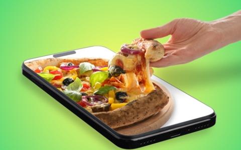 Pedaço de pizza saindo de celular - aumentar vendas no Instagram